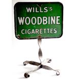 A Wills's Gold Flake / Woodbine metal advertising sign, on wrought iron stand. A rectangular