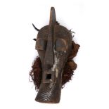 Tribal mask, Songye, Congo. A large carved wood mask, the contour incised face, with square,