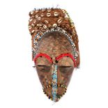 Tribal mask, Bushongo, Central Congo. A painted carved wood mask, worn at secret military society