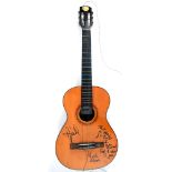 Niall Horan, his first guitar, signed. Inscribed in felt-tip pen, 'This was the first guitar I