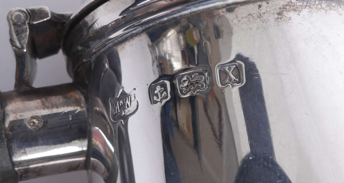 A collection of George V silver wares by Asprey, Mappin and Webb and Adie. A hot water jug, - Image 4 of 7