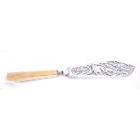 A George III Irish silver ivory-handled fish slice. 1775 The spear-shaped blade pierced in a