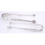 Two George III Irish silver sugar tongs, by Benjamin Tait. Each with shell-shaped bowls and