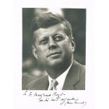 1963 John F. Kennedy signed photograph. A black and white photograph of Kennedy inscribed in black