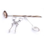 George II Irish silver sugar nips, George III Irish silver toddy ladle and a Cork silver teaspoon.