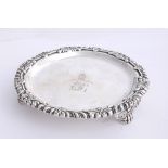 A George IV Irish silver waiter by Edward Crofton. Of heavy gauge, the gadrooned and scrolling