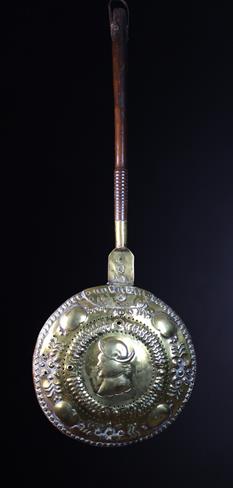 A 17th Century Repoussé Brass Warming Pan (A/F).