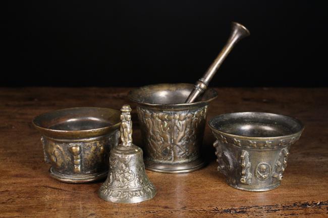 Three 16th/17th Century Bronze Mortars & A Bell: An Italian pestle & mortar cast with pairs of