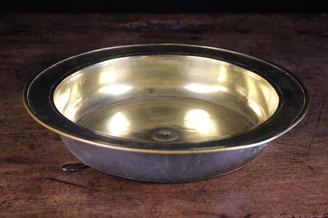 A 17th Century Brass Bowl with lathe turned decoration, 11¾ in (30 cm) in diameter.