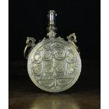 A 19th Century Ottoman Brass Gun Powder Flask of flat circular form.