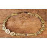 A 17th Century Polish Bronze & Glit Brass Belt composed of decoratively cast links.