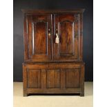 A Fine 18th Century Welsh Joined Oak Cupboard of good colour and patination.