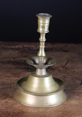 A Brass Candlestick, Mid 16th Century English style,