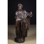 A Large 16th/Early 17th Century Carved Oak Sculpture of a barefoot bearded saint;