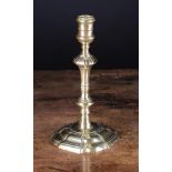 An Attractive Mid 18th Century English Seamed Brass Candlestick 9 in (23 cm) in height.