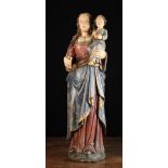 A 16th Century Alsace Carving of Madonna & Child enriched with polychrome.