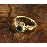 A Renaissance Gold-coloured Ring with emerald and residual enamel.