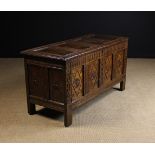 A Large 17th Century Inlaid Oak Court Cupboard.