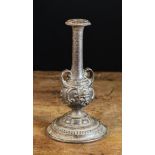 An Unusual Cast iron Candlestick.