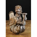 A 15th Century English Naively Carved Angel/Wall Sconce.