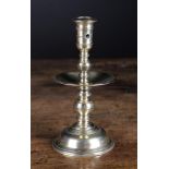A Mid 17th Century Brass Heemskirk Candlestick 7½ in (19 cm) in height.