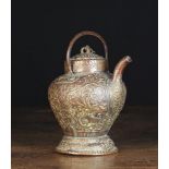 A 17th Century Italian Copper Wine/water Vessel with lid, spout and handle,