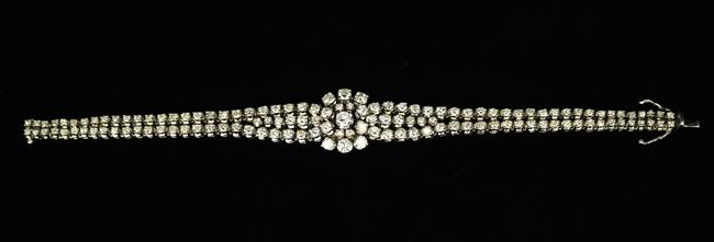 A Fabulous 18 Carat White Gold Bracelet (unmarked) set with 131 diamonds radiating from a central