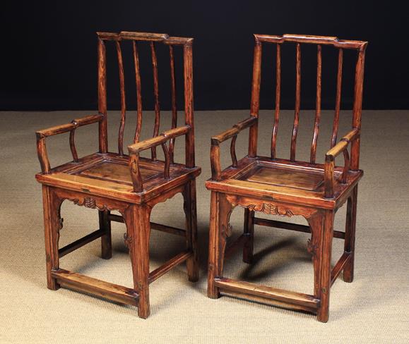 A Pair of Chinese Lacquered Ash Armchairs, 39½ in (100 cm) high, 19¾ in (50 cm) in width.