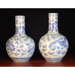 A Similar Pair of Large Early 20th Century Blue & White Chinese Bottle Vases.