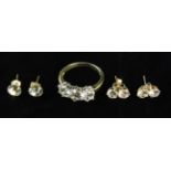 A Victorian Trilogy Ring set with three paste 'diamonds' and two pairs of Victorian flint glass