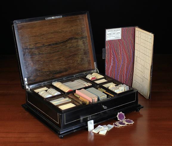 A 19th Century Ebony Games Box inlaid with engraved bone embellishments.