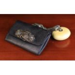 An Antique Sagemono Pouch with Ivory Manju Netsuke.