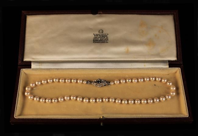 A Pearl Necklace with 18 Carat Clasp, in a Garrard & Co Ltd case.