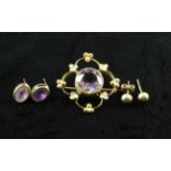 An Amethyst & Seed Pearl 9 carat Gold Brooch and two pairs of gold stud earrings;