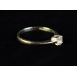 A .25 Carat Diamond Solitaire Ring on an 18 carat gold shank.