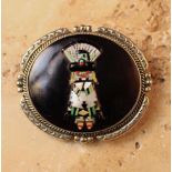 A Vintage Zuni Silver Belt Buckle, displaying a "Shalako" character sticking out his tongue.