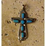 An Intricate and Attractive Silver Cross Pendant, set with turquoise stones.