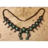 A Beautiful and Striking Substancial Navajo Vintage Silver Squashed Blossom Bench Beaded Necklace.