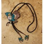 An Impressive Naturalistic Vintage Owl Bolo,with carved turquoise, mother or pearl and jet.