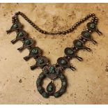 An Interesting and Appealing, Highly Decorative Squash Blossom Vintage Silver Necklace,