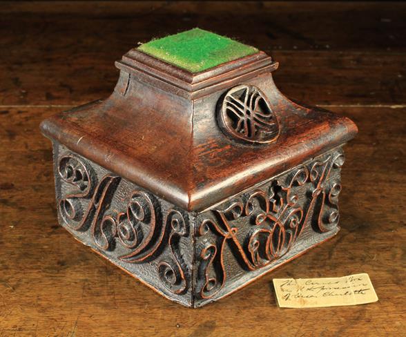 An Unusual 18th Century Oak Box carved with decorative entwined strap-work and scrolling initials