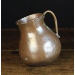 A 15th Century Seamed Bronze Vessel with bulbous round bottomed body and side handle,