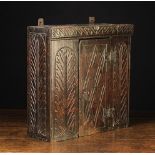 A Small 17th Century Boarded Oak Mural Cupboard.