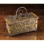 A Rare 16th Century Casket of rectangular form clad in sheets of repoussé brass decorated with
