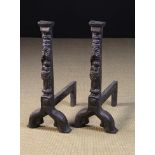 A Pair of 16th Century Cast Iron Fire Dogs.