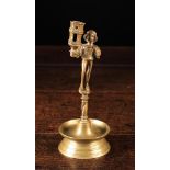 A 15th/16th Century Style Figural Brass Candlestick.