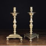 A Pair of Bronze Candlesticks Circa 1700.