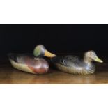 Two 19th Century Painted Wooden Decoy Ducks with inset glass eyes.