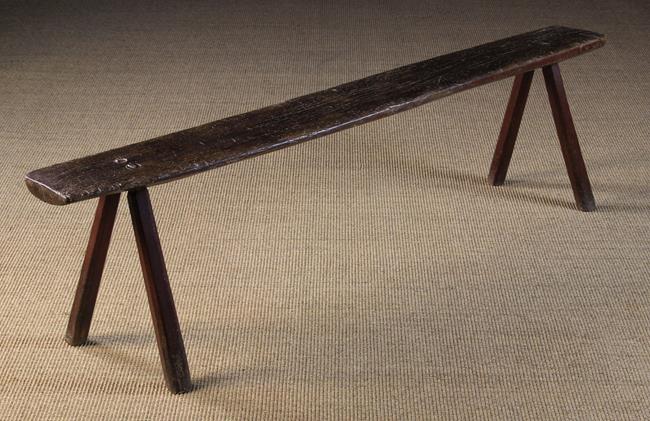 A Late 18th/Early 19th Century Rustic Bench Stool.