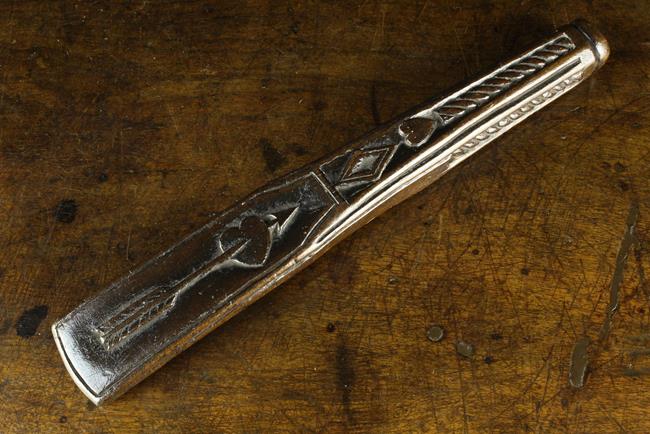 A 19th Century Carved & Ebonised Treen Knitting Sheath/lover token, decorated with a pierced heart,